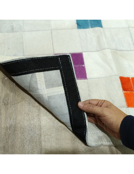 White Patchwork Leather Rug with Colors, at alfombras imperio1979.com.