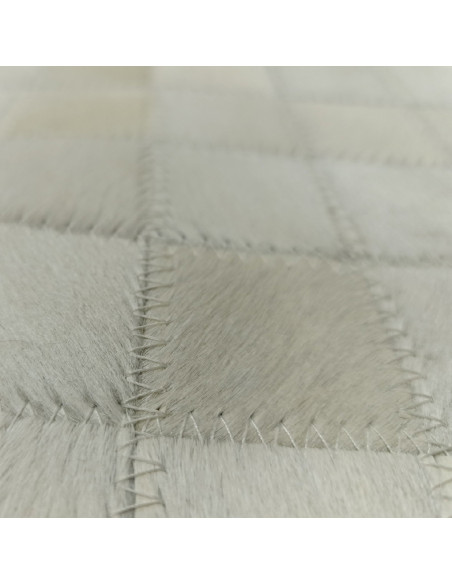 Patchwork white leather rug, at alfombrasimperio1979.com.