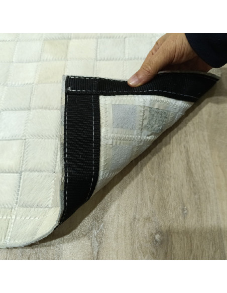 Patchwork white leather rug, at alfombrasimperio1979.com.